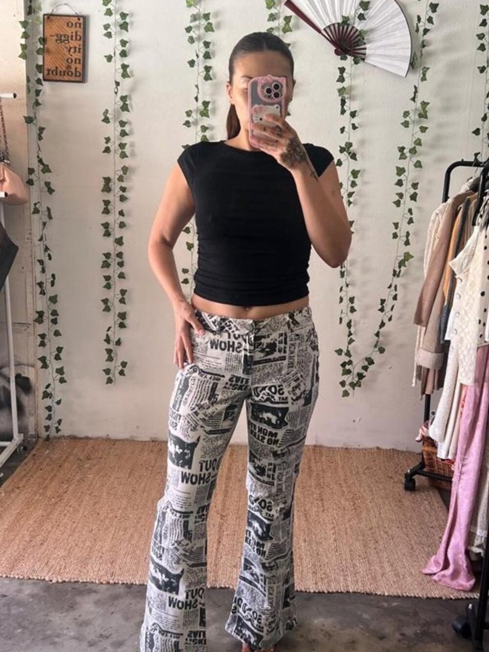 Garage low rise flare jeans in a black and white newspaper print size 3
